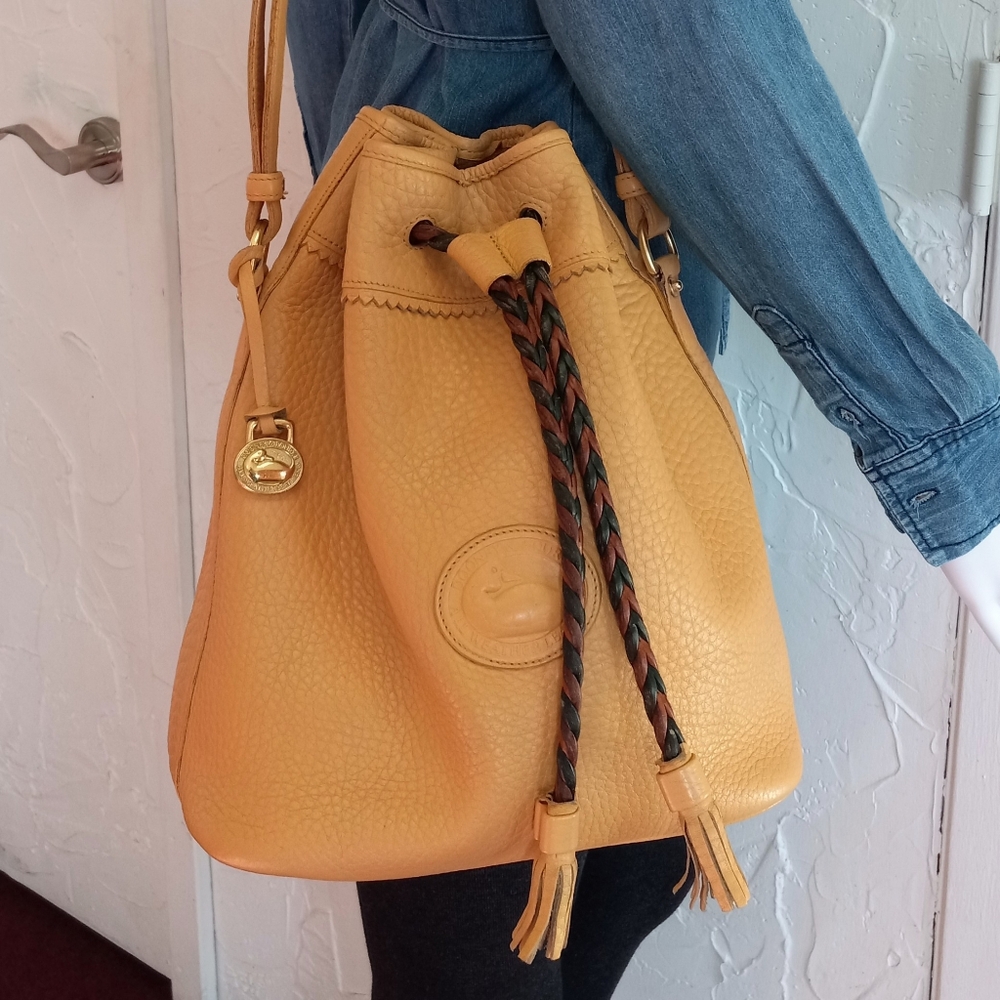 Dooney & Bourke Vintage, Teton Drawstring Bag in solid Palomino Yellow